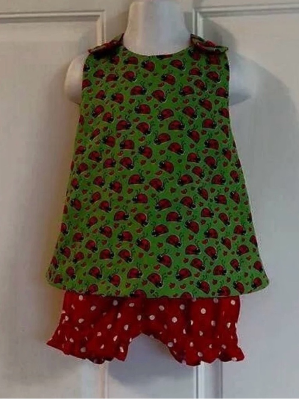 Size 2 NWOT Custom Made red/green ladybug cross top/bloomer set. Vintage patter